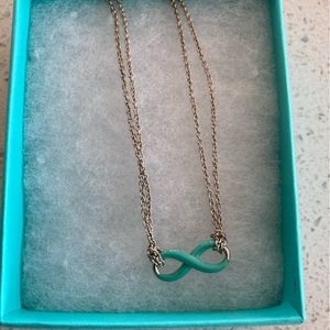 Tiffany& Co. Infinity pendant necklace in sterling silver.